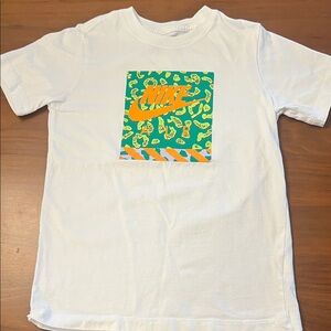 Nike Kids White Tee with Orange and Green Graphic